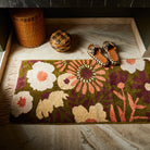 Extra long bath mat with flowers on it