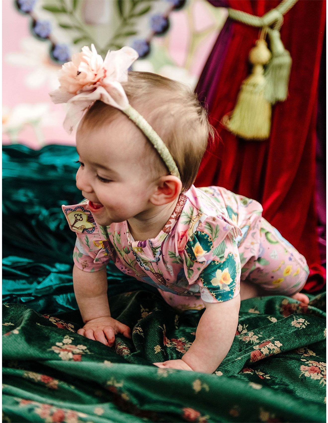 baby wearing All My Hearts Precious Shorty Frill Coverall by Fleur Harris - Parfait Pink