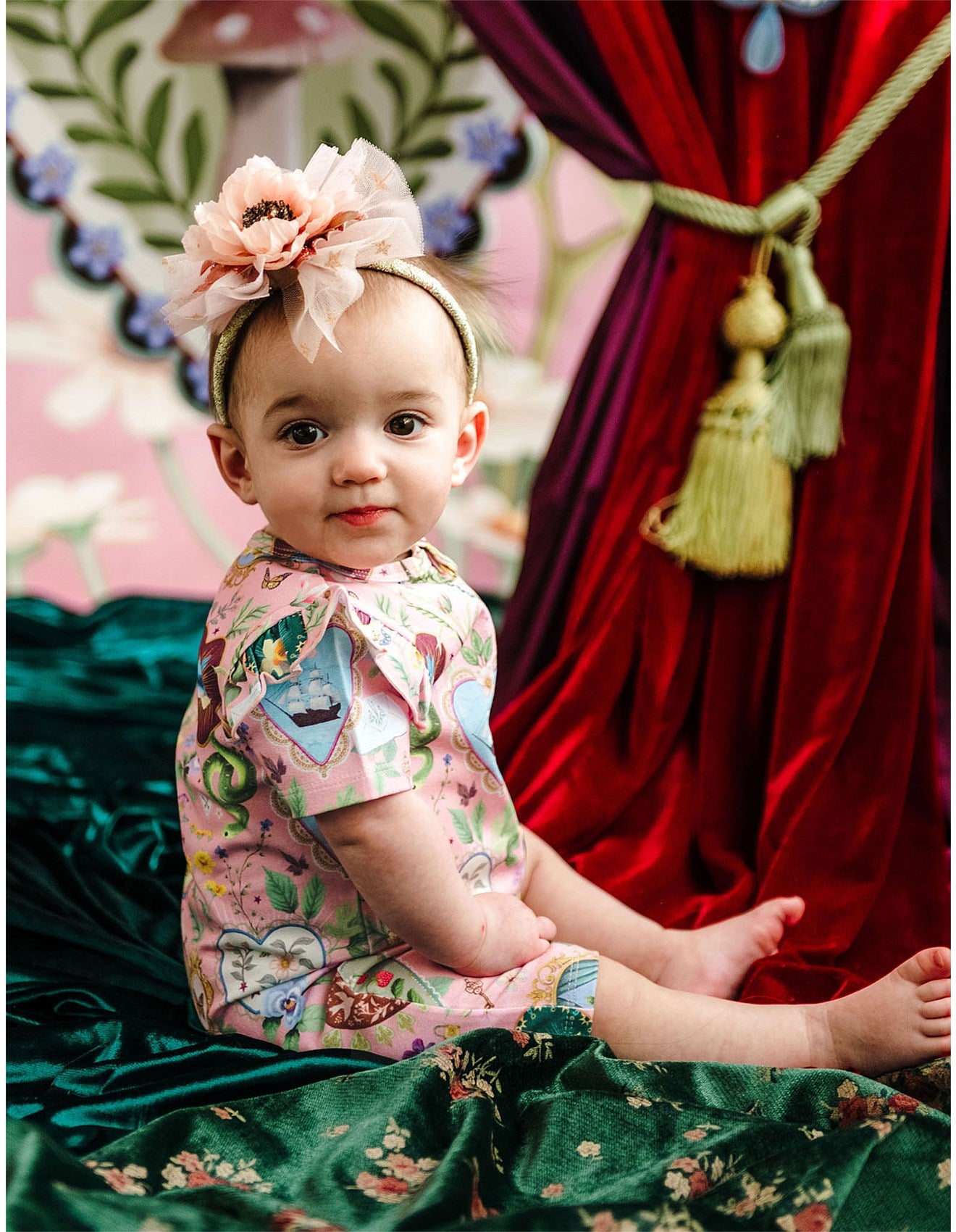 pink baby onesie by Fleur Harris