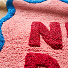 close up texture of Amalie Nudie Bath Mat - Hibiscus by Sage & Clare