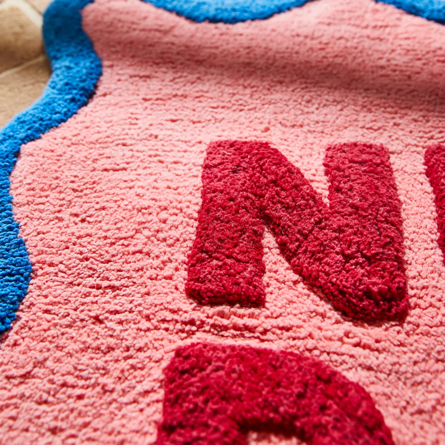 close up texture of Amalie Nudie Bath Mat - Hibiscus by Sage & Clare