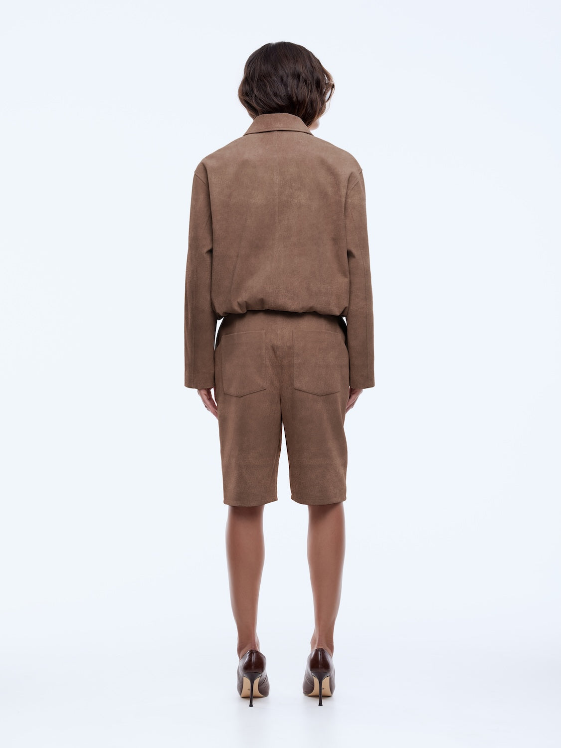 back view of model wearing Ana Suede Bomber by Ena Pelly