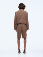 back view of model wearing Ana Suede Bomber by Ena Pelly