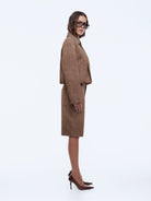 side view of model wearing Ana Suede Bomber by Ena Pelly