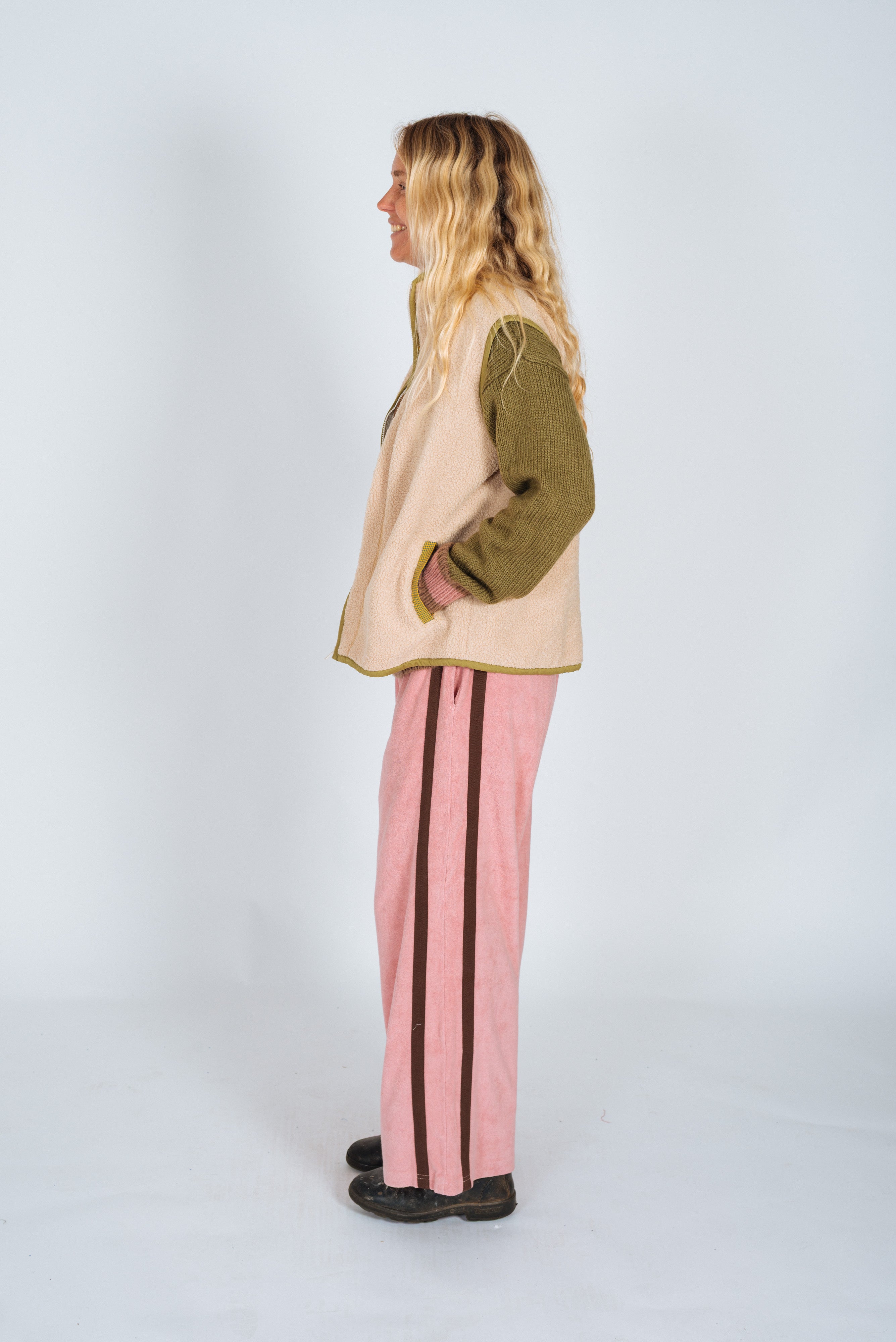Side profile view of Après Surf Panel Pant in blush showing full length and wide leg silhouette