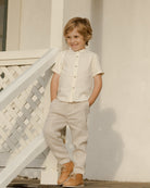 Young boy wearing the Archie Shirt Ivory | Noralee