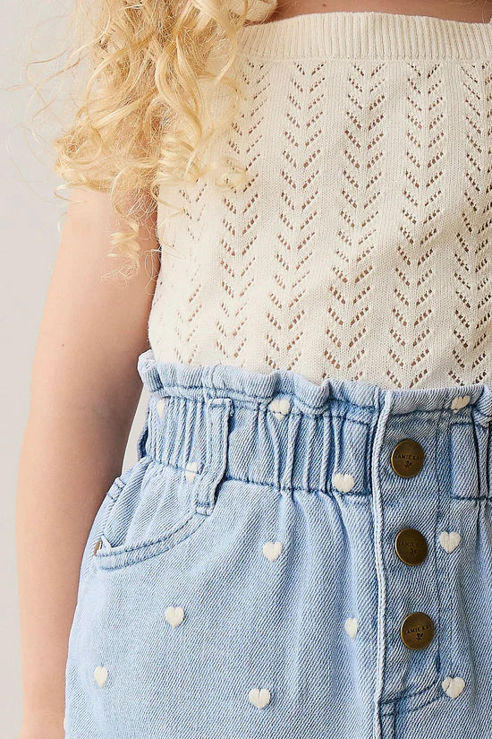 Close up detail of model wearing Aria Knitted Singlet Parchment by Jamie Kay