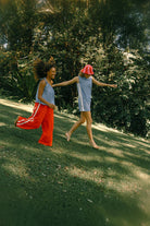 red 100% cotton terry towelling pants with white stripe