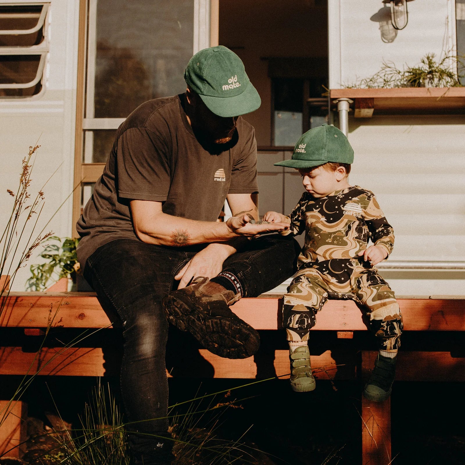 Man wearing rad dad tshirt next to child wearing rad kid clothing by Banabae