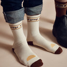 Man wearing Banabae Rad Pop socks in cream and brown