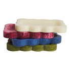 Stack of five colorful small trays in cream coral blue and yellow showing marbled resin texture