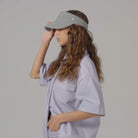 model wearing Berkley Wool Visor by Helen Kaminski - light grey