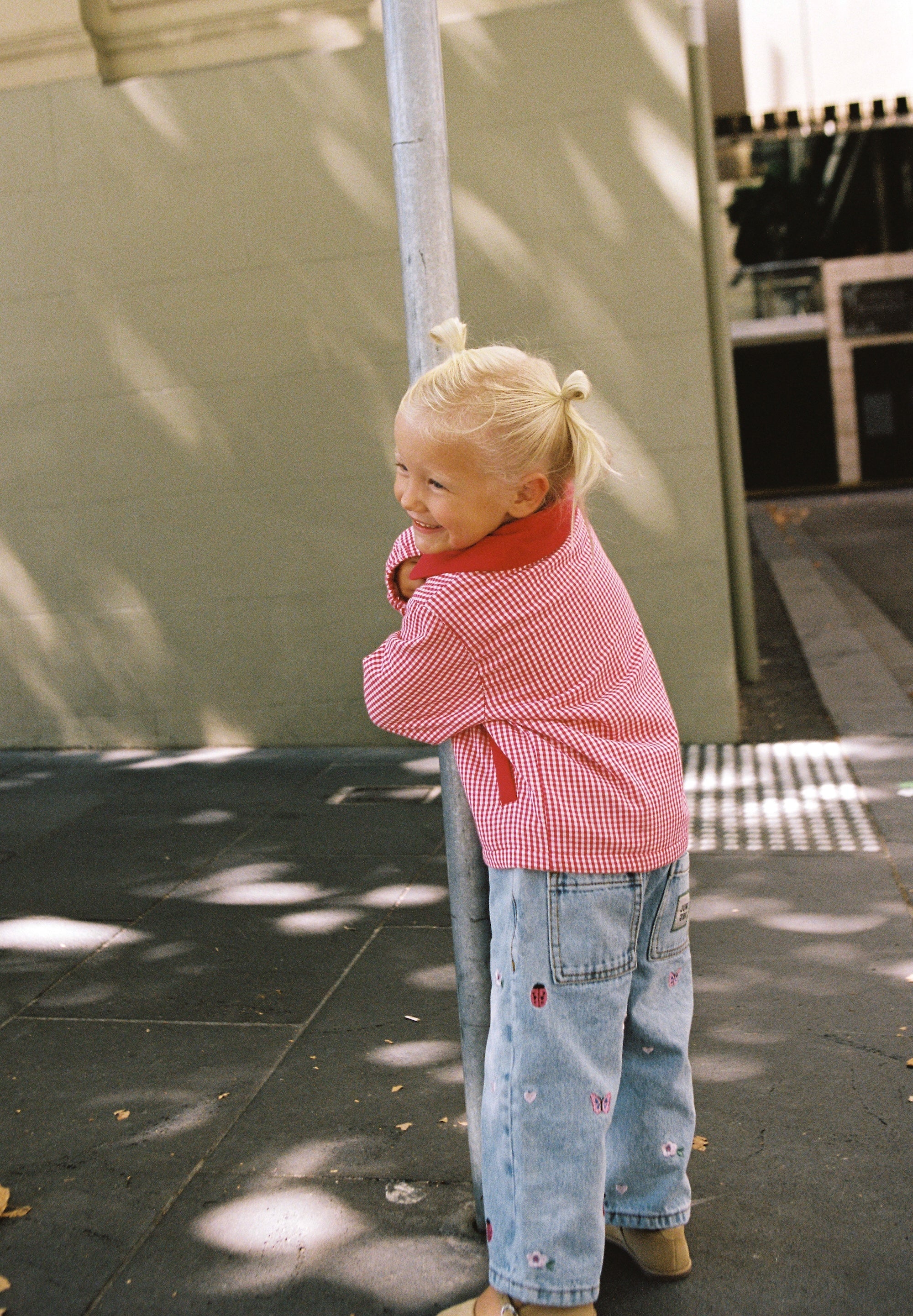 girl wearing Blair Jean Garden Embroidery by Juni