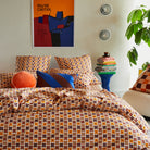 Blanca Ric Rac Cushion Blue Jay by Sage & Clare style on bed