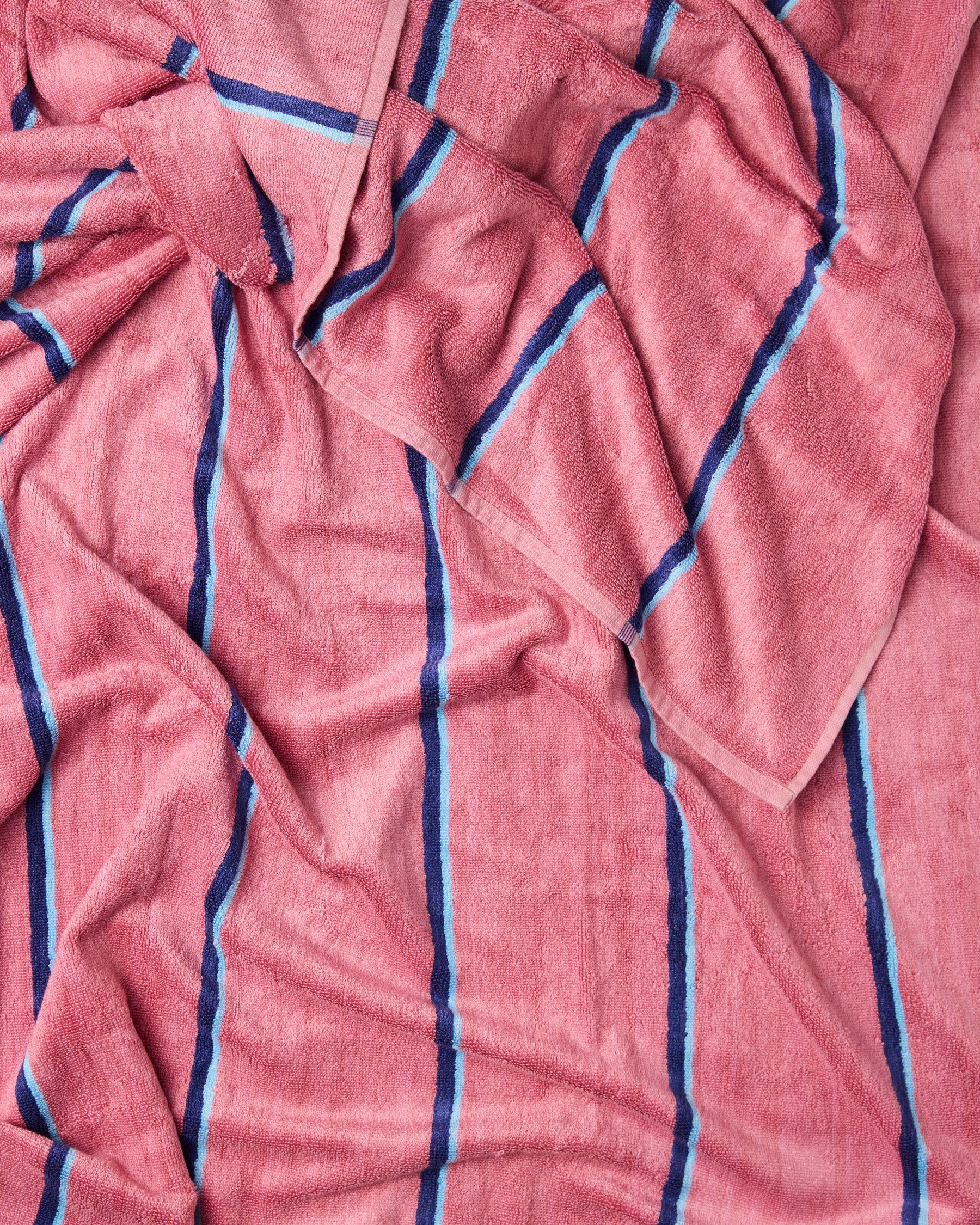Close-up detail of Blushing Stripe bamboo terry fabric showing textured surface and navy blue stripe pattern