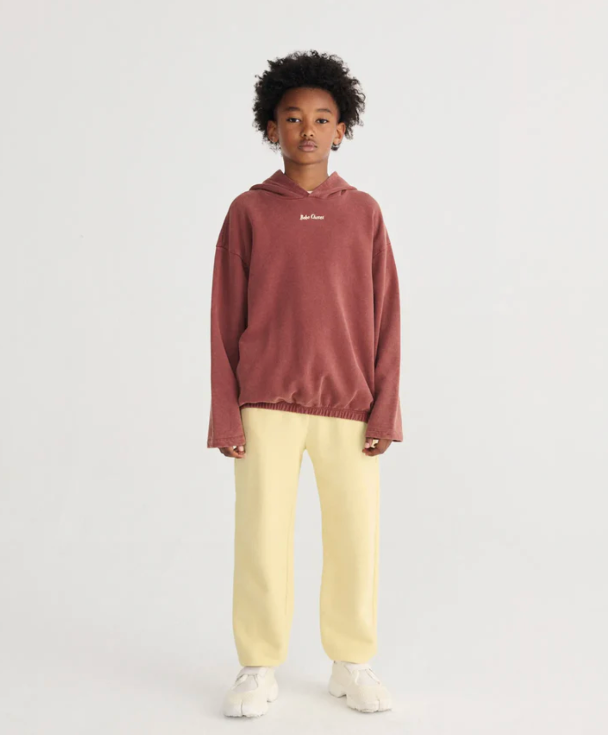 Boy in Bobo Choses Jogging Pants - Yellow | Bobo Choses