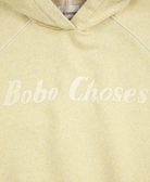 Close up of text on the Bobo Choses Sleeveless Hoodie - Yellow | Bobo Choses