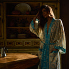 Bonny Cotton Robe in Turquoise — cream and turquoise floral check print, belted, front view standing