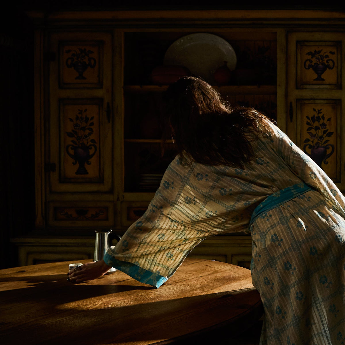 Bonny Cotton Robe in Turquoise — back view showing turquoise trim cuffs and floral check cotton fabric