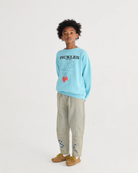 Boy wearing Bunch Of Vegetables Sweatshirt - Light Blue | Bobo Choses