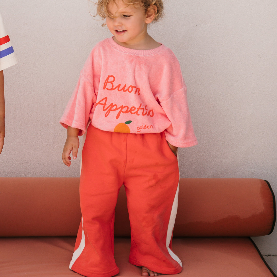 Front view of the Buon Appetito T-shirt - Pink Icing | Golden Children