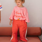 Front view of the Buon Appetito T-shirt - Pink Icing | Golden Children