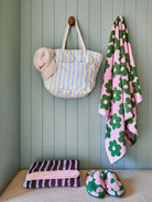  Butter Blue Seersucker Quilted Bag by Mosey Me hanging on a wall 