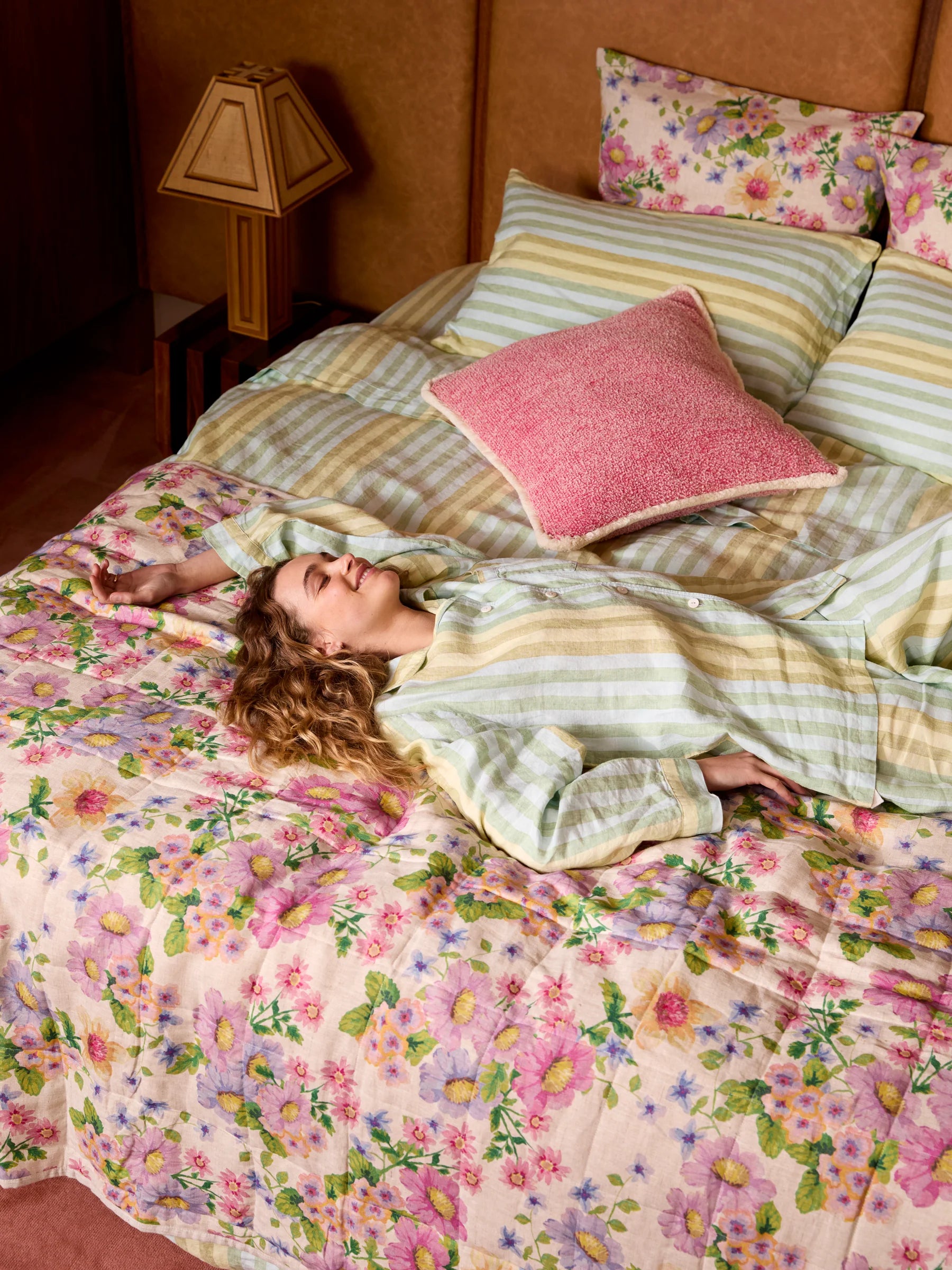 pink floral bedspread with olive floral reverse by Bonnie & Neil