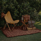 Outdoor camping setup with Camp Picnic Rug by Wandering Folk featuring waterproof design and fringe trim