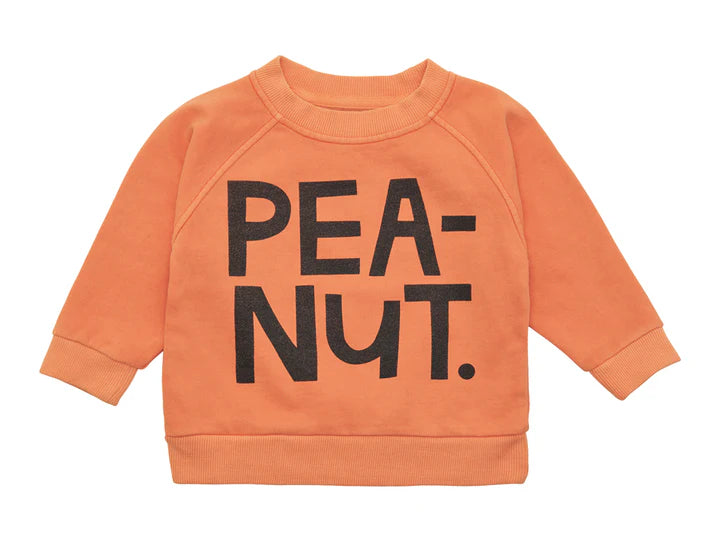 Tangerine cotton fleece sweater with black text that says PEANUT