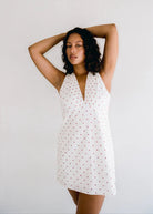 Clara Mini Dress – Cherry Polka Dot by Juni - white and red polka dot dress with plunging neckline
