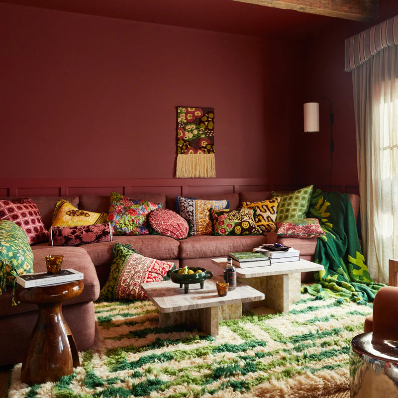 Lounge displaying Sage & Clare cushions including the Claudelle Punch Needle Cushion by Sage & Clare