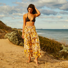 model at the beach wearing Clementine Maxi Skirt by Sage & Clare