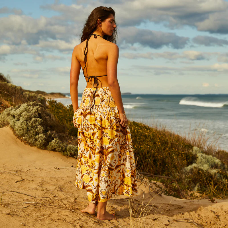 long retro floral skirt in yellow white and brown. Made from cotton with a shirred waist for comfort