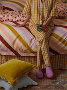  lady wearing Cloud Slipper in Orchid by Mosey Me 