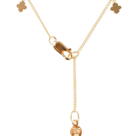 Back of gold clover charm necklace by Fairley
