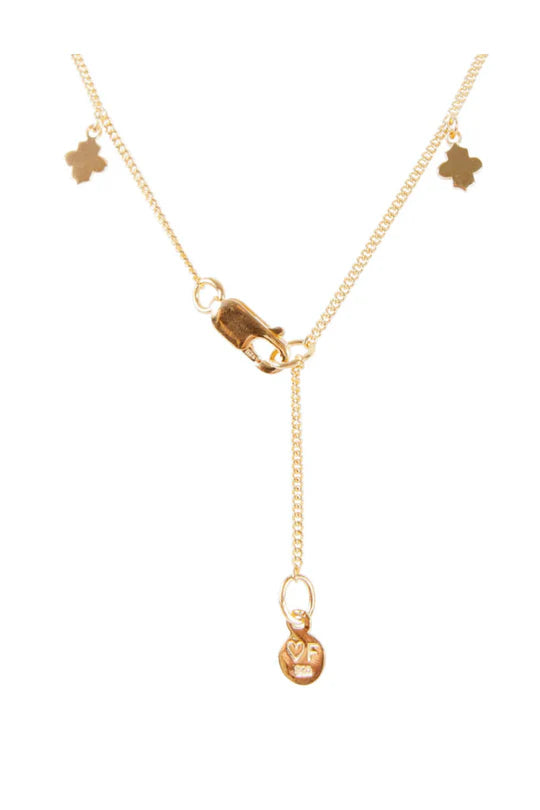 Back of gold clover charm necklace by Fairley