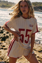 lady wearing Club 55 Tee - Red by Indigo & Wolfe