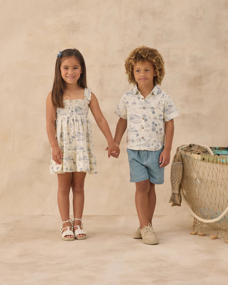 Boy and girl wearing clothing with the ocean toile print