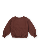 Back view of brown embroidered sweater showing crew neckline and long sleeve construction