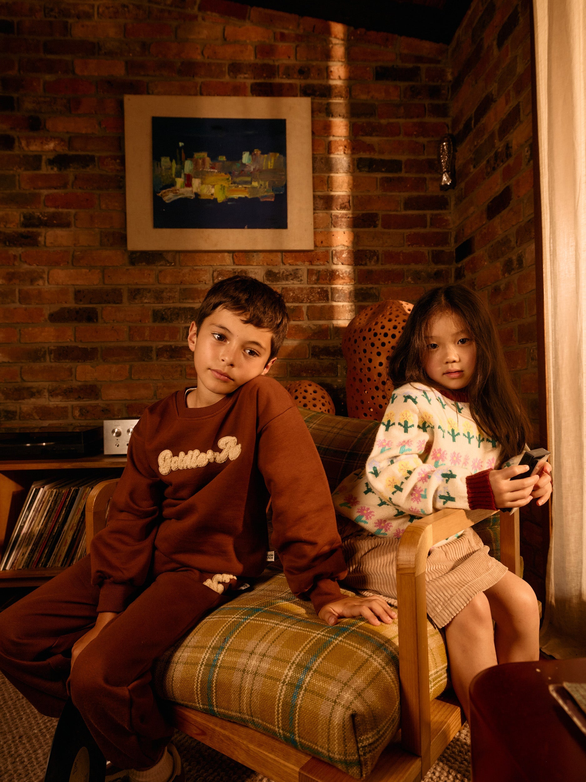 Brown embroidered sweatpants worn with brown sweatshirt showing matching set coordination
