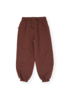 Flat lay of brown comfy embroidered sweatpants showing elastic waistband and cuffed ankles