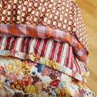 Folded Cora bedcover Pearl demonstrating soft cotton texture and thickness