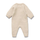 Back side of the Cream Organic Knitted Bauble Growsuit | Wilson + Frenchy