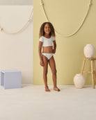 Girl wearing Cropped Rashguard Set Green Fleur | Rylee + Cru