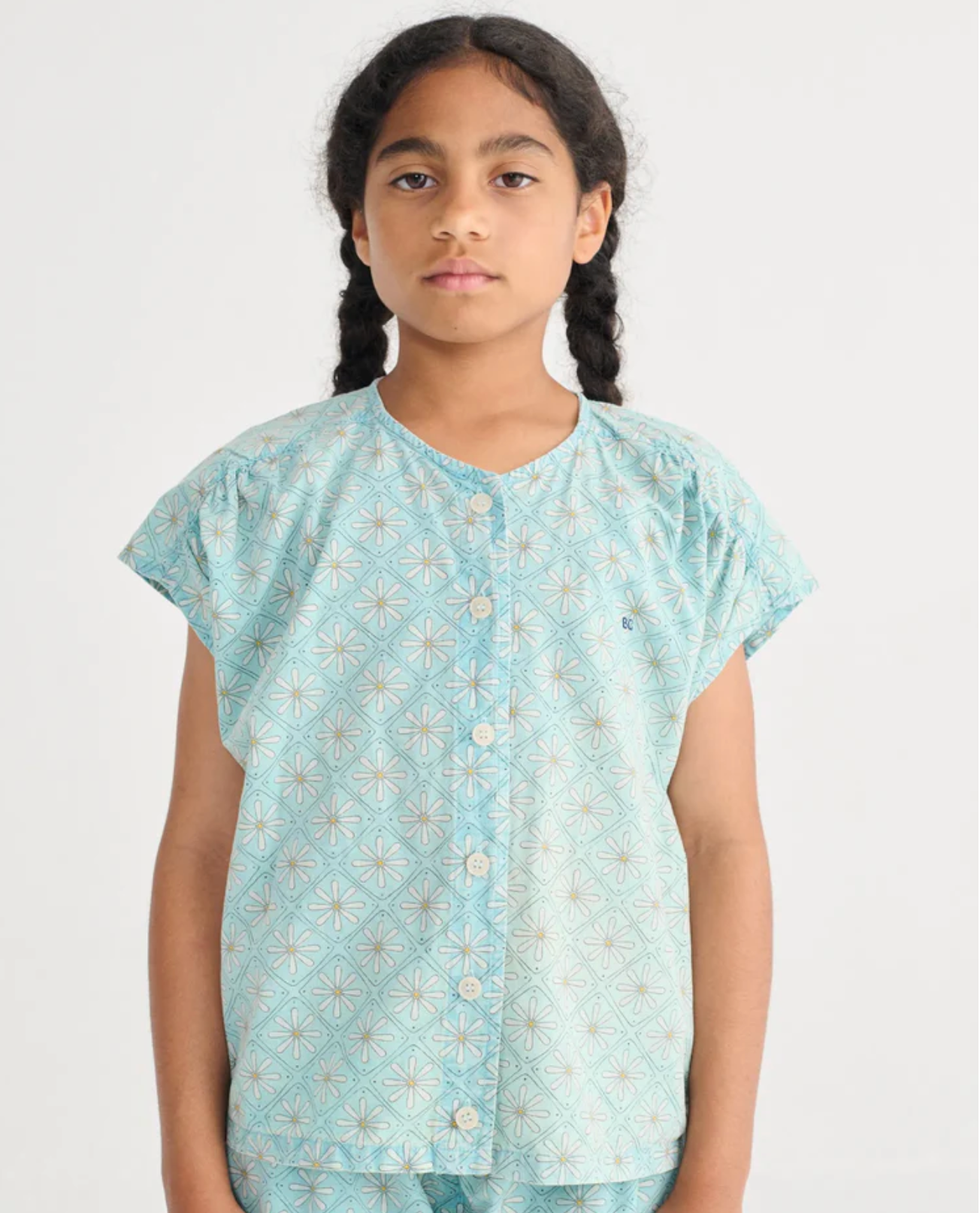 Young girl wearing the Daisy Mosaic All Over Woven Top - Light Blue | Bobo Choses