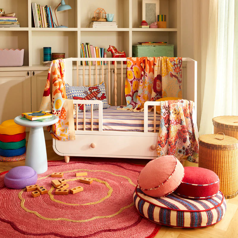 Room with Sage & Clare homewares including the Delana Round Cushion - Hibiscus by Sage & Clare