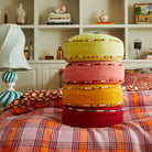 Stack of Delana round cushions by Sage & Clare