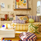 Delana Round Cushion - Zest by Sage & Clare displayed in loungeroom