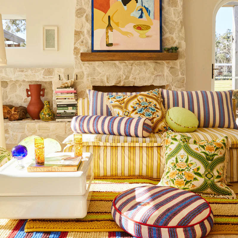 Delana Round Cushion - Zest by Sage & Clare displayed in loungeroom